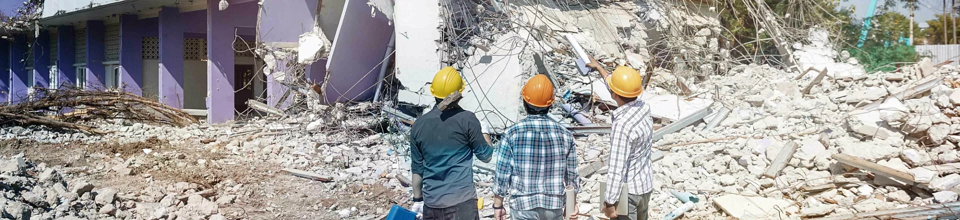 Engineer architect and worker operation control demolish old building