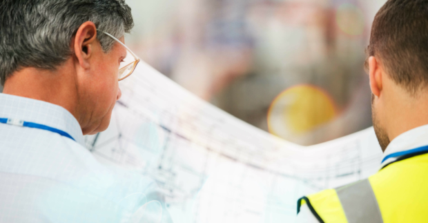 engineers, consultants looking at blueprints