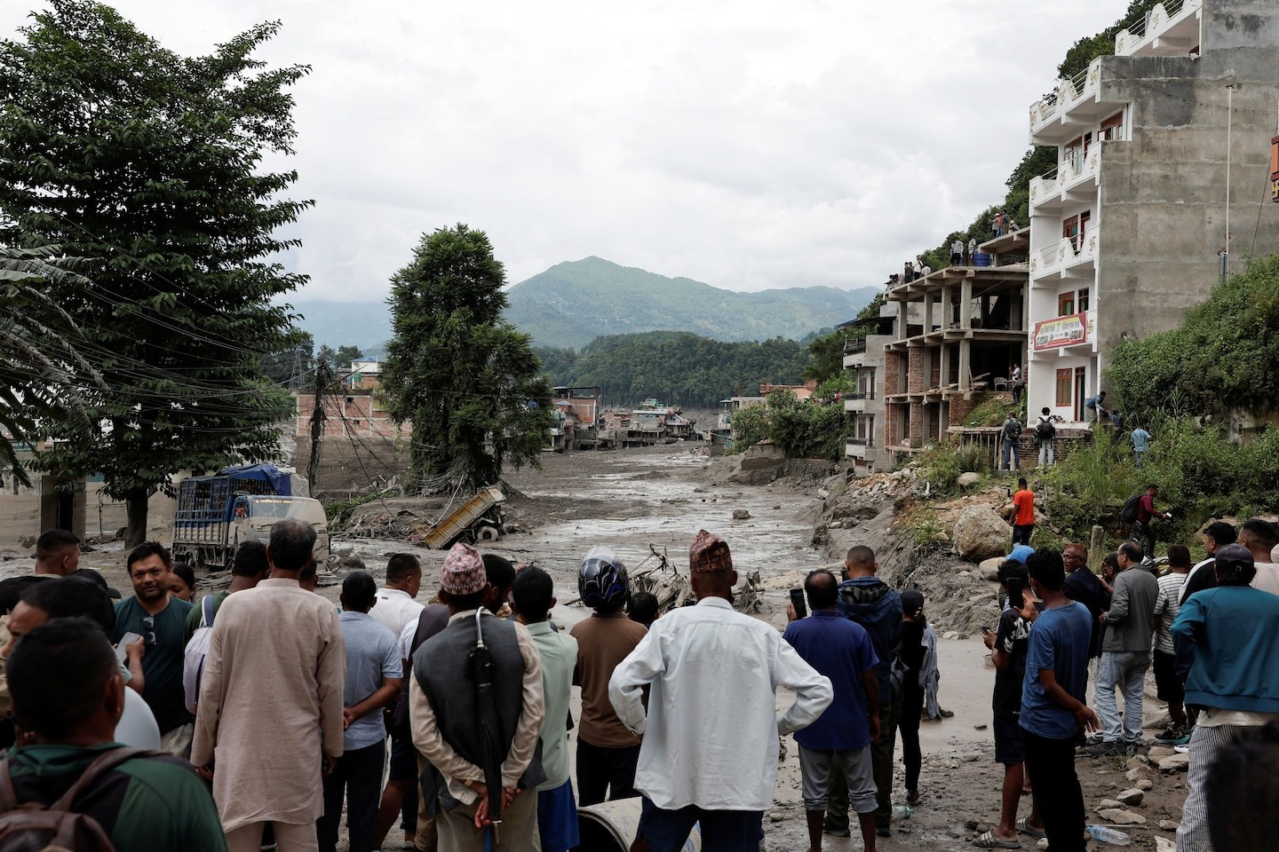 Scores dead, hundreds missing in flash floods on Nepal-China border