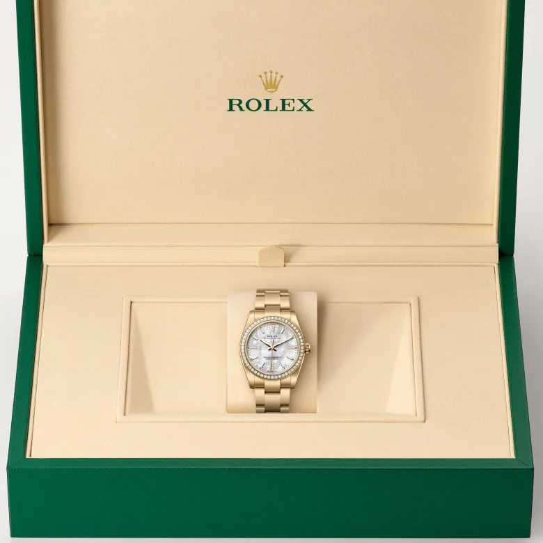 Rolex Oyster Perpetual in 18 kt yellow gold, M124248RBR-0001 - Heller Jewelers