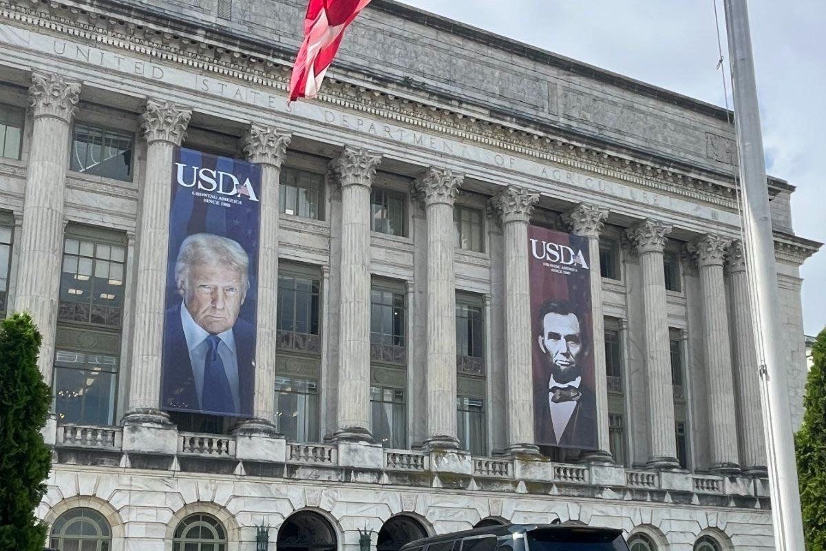 Donald Trump on a banner, paid for with your tax dollars