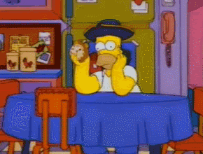Homer Simpson shaking a clock
