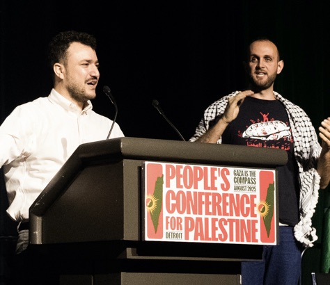 Photo of Mahmoud Khalil speaking at the People's Conference for Palestine
