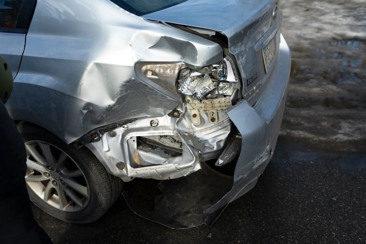 Photo of Christian Molina's car damaged by ICE.