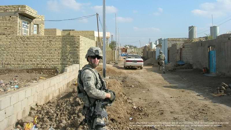 Image of Congressman Deluzio in uniform with military disclaimer