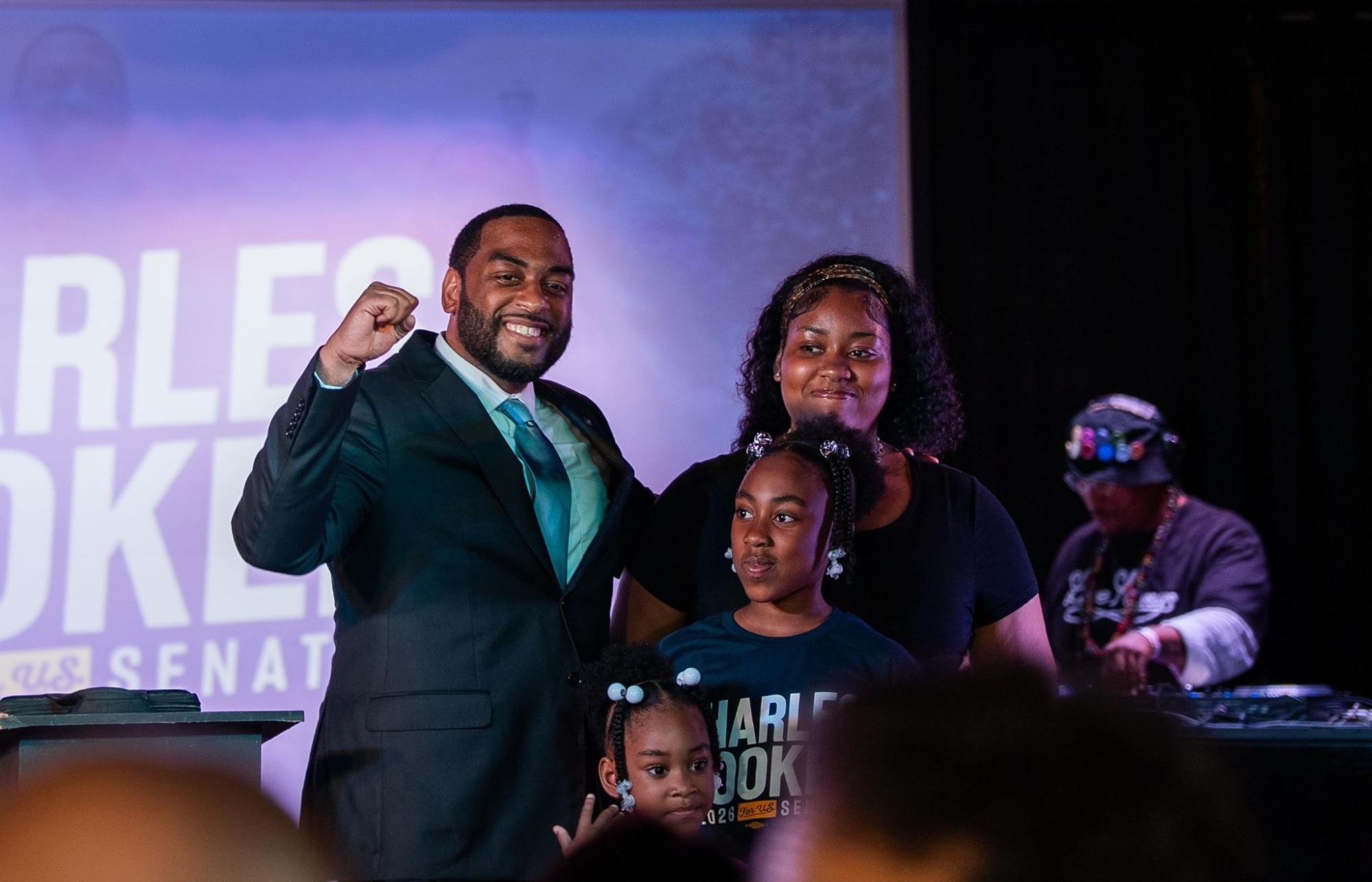 Image of Charles Booker with his family on Election Night