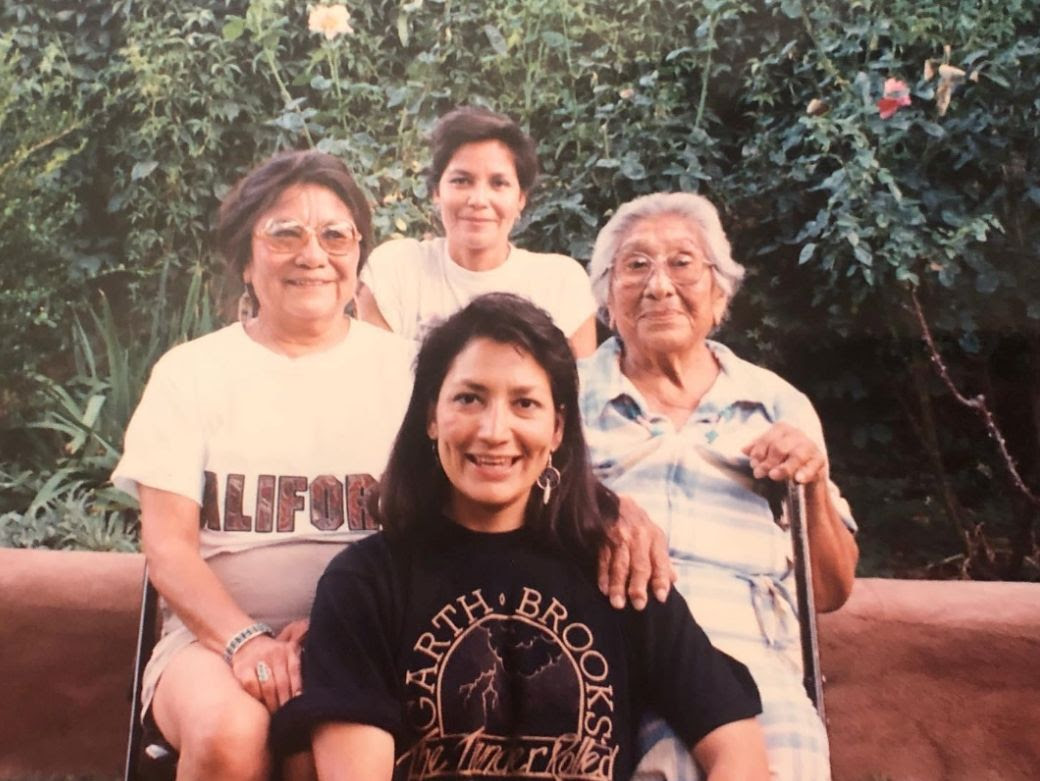 Image of Deb Haaland with multiple generations of her family.