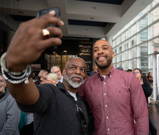 LeVar Burton taking a selfie with Mandela Barnes