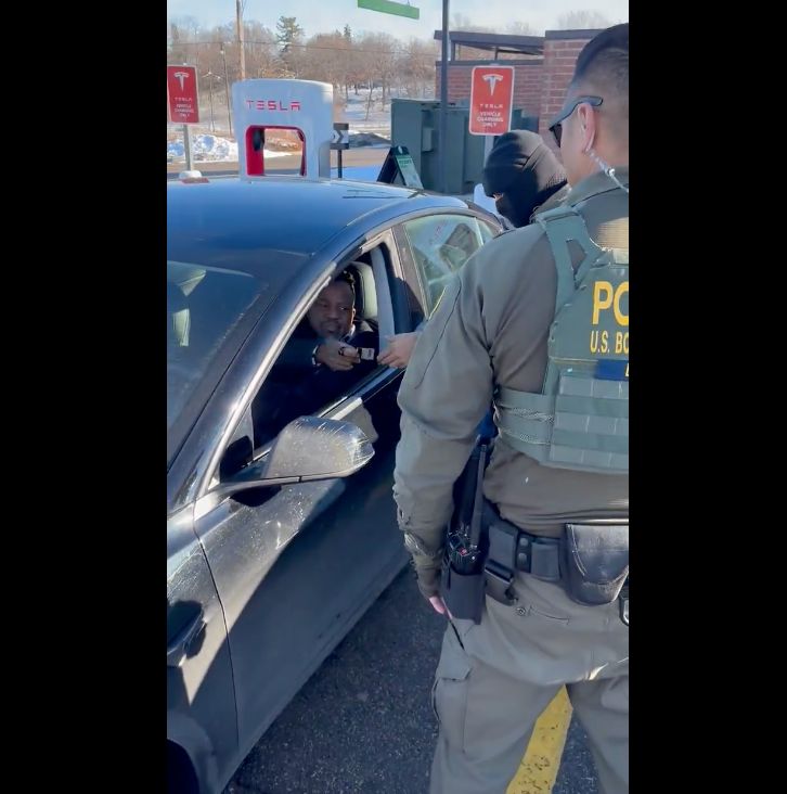 ICE agents going car to car looking for people of color, asking each to prove they were citizens or risk being dragged away.