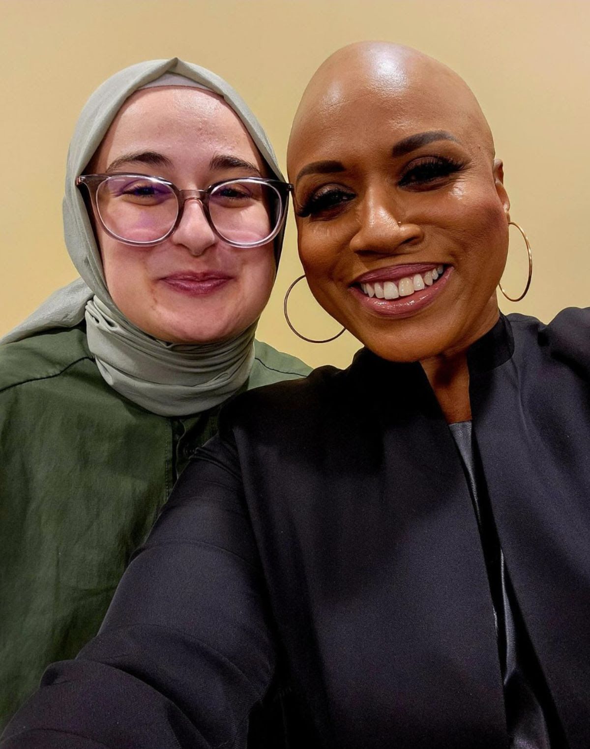A selfie of Rümeysa Öztürk and Ayanna Pressley, both smiling into the camera.