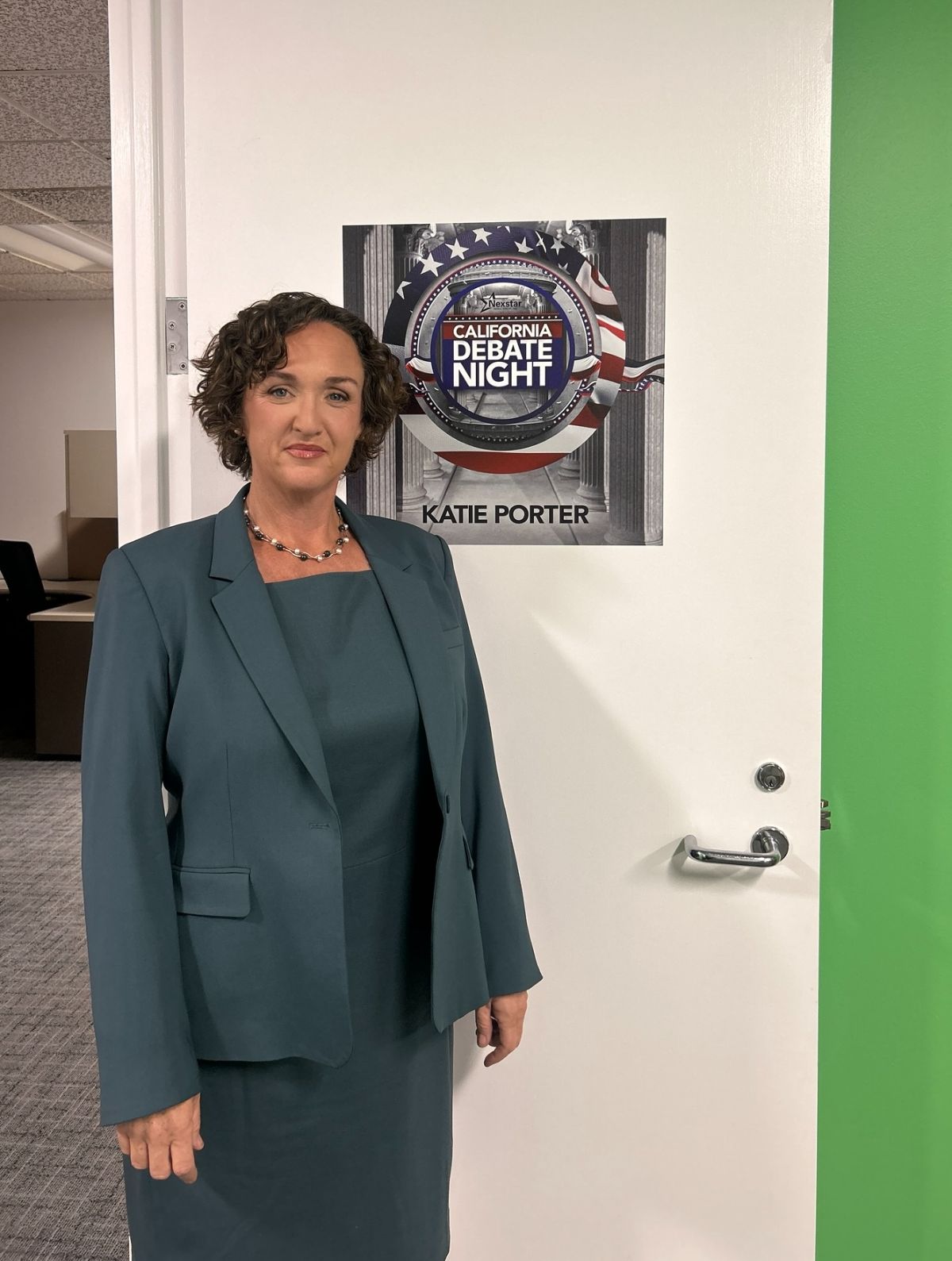 Katie at the first California Governor debate