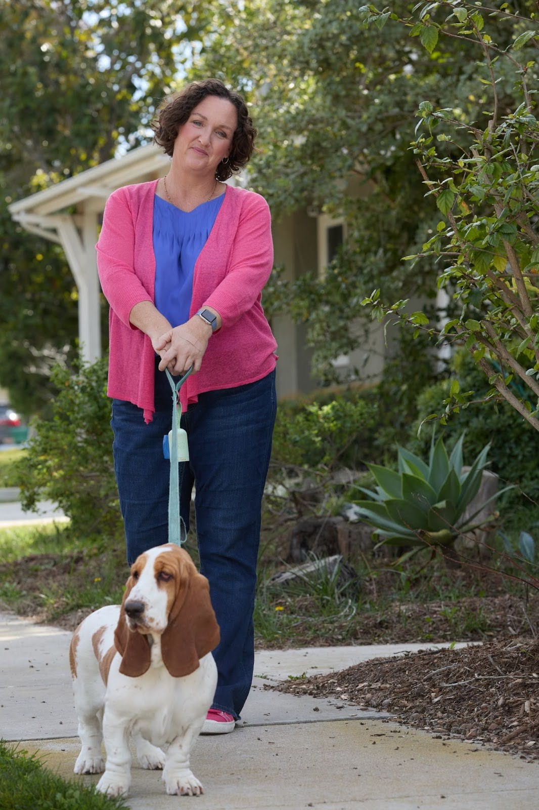 Katie Porter walking her Basset Hound, Poppy.