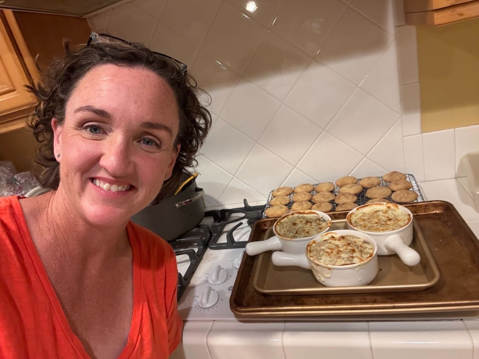 Katie making French Onion soup and snickerdoodles.