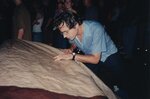 <a href='/fugazi_live_series/washington-dc-usa-82699'>Nick mixing through a covered soundboard in the rain at Fort Reno, Washington, D.C. 8/99 - Photo © by Amy Pickering</a>