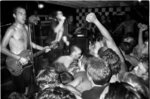 <a href='/fugazi_live_series/lawrence-ks-usa-61190'>Outhouse, Lawrence, KS USA 6/11/90 - Photo © by Ryan Schierling</a>