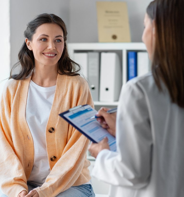 Doctor advising patient on her treatment plan