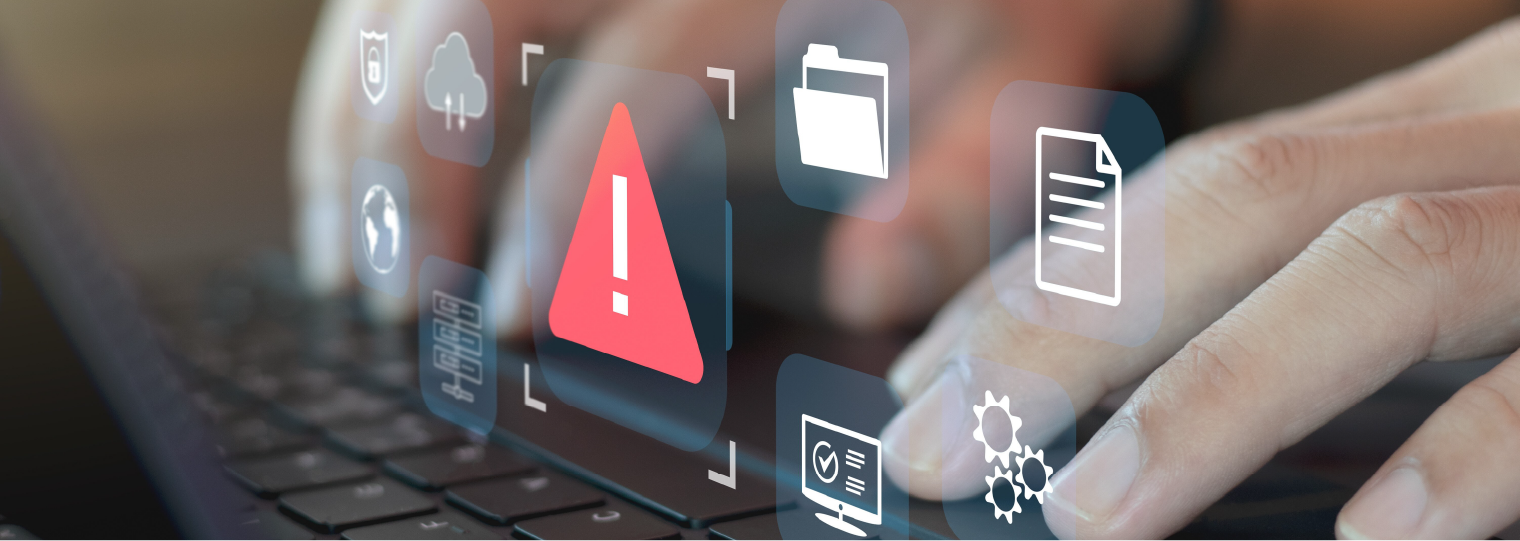 Person using a keyboard with and warning sign being displayed along with some web related icons