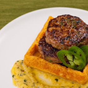 Duck poblano jalapeno chili sausage on sweet potato waffles