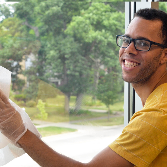 Kristian cleaning windows