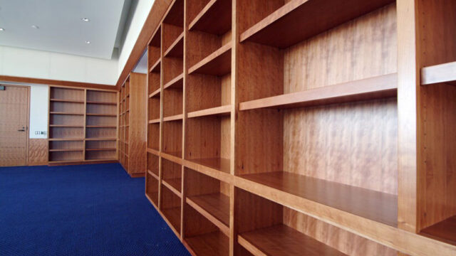 Commercial cabinet and millwork installation by Seufert carpentry team in medical facility.