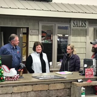 The ROP Shop / Outdoor Concepts owners being surprised with the Wells County Chamber of Commerce Business of the Year award for 2019.