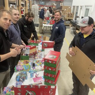 The ROP Shop Employees packing Christmas Boxes for Samaritan Purse's Operation Christmas Child