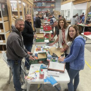 The ROP Shop Employees packing Christmas Boxes for Samaritan Purse's Operation Christmas Child