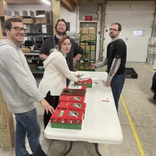 The ROP Shop Employees packing Christmas Boxes for Samaritan Purse's Operation Christmas Child