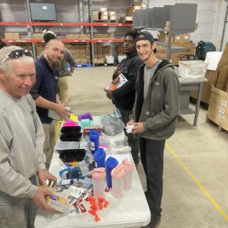 The ROP Shop Employees packing Christmas Boxes for Samaritan Purse's Operation Christmas Child