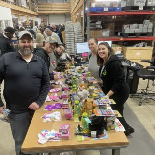 The ROP Shop Employees packing Christmas Boxes for Samaritan Purse's Operation Christmas Child