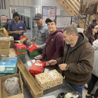 The ROP Shop Employees packing Christmas Boxes for Samaritan Purse's Operation Christmas Child