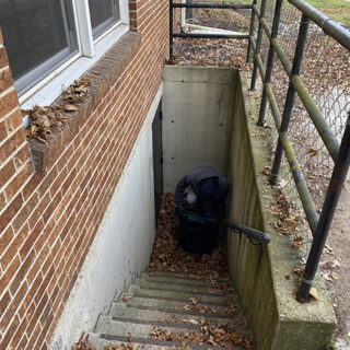 The ROP Shop and OCi volunteering their time to help with grounds keeping at Gateway Woods