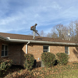 The ROP Shop and OCi volunteering their time to help with grounds keeping at Gateway Woods