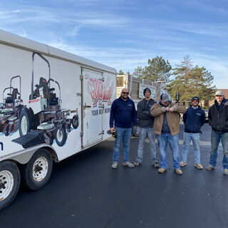 The ROP Shop and OCi volunteering their time to help with grounds keeping at Gateway Woods