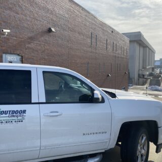 Officers helping unload gifts brought to hand out to inmates for Christmas Behind Bars through the volunteers at The ROP Shop and Outdoor Concepts.