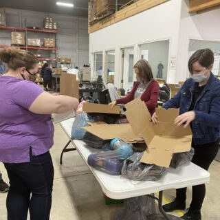 ROP Shop employees volunteer their time to help Samaritan's Purse Operation Christmas Child.