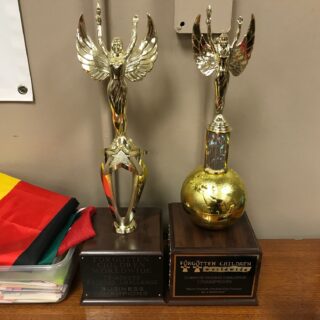 Employees of The ROP Shop and Outdoor Concepts sort and pack clothing to be shipped out by Forgotten Children Worldwide to needy around the world.