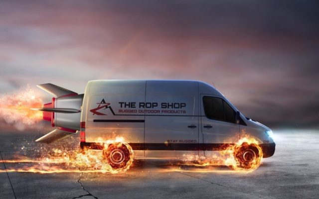 Delivery van with rocket attached and flames coming off wheels to represent speed.