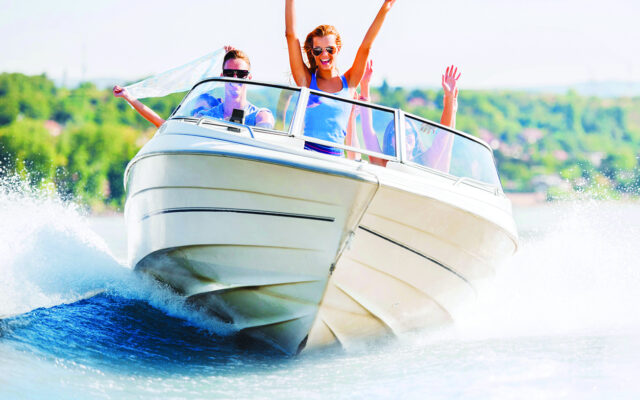 People enjoying a motor boat ride