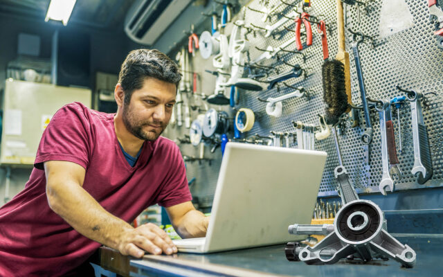 A man surfing the web for a replacement Power Pressure Washer Pump.