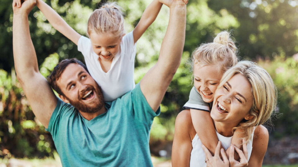 A family of four enjoys time outside