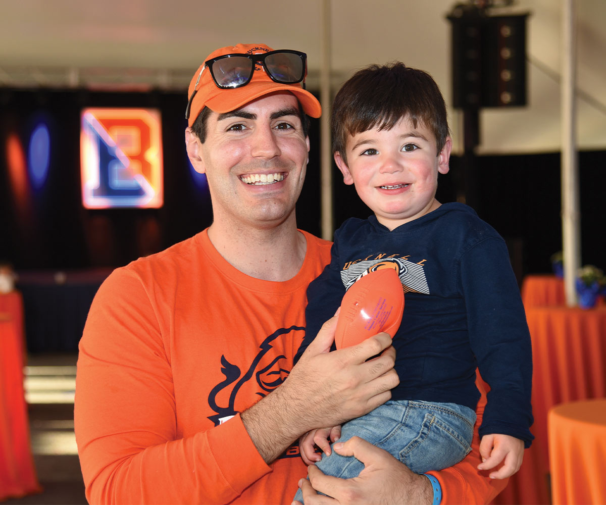 An alumni with his son 