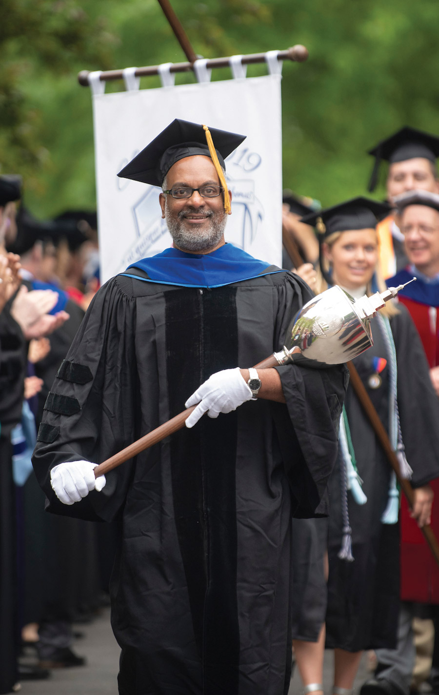 Grand Marshal and Associate Dean of the Faculty Michael James Grand Marshal and Associate Dean of the Faculty Michael James led the procession.