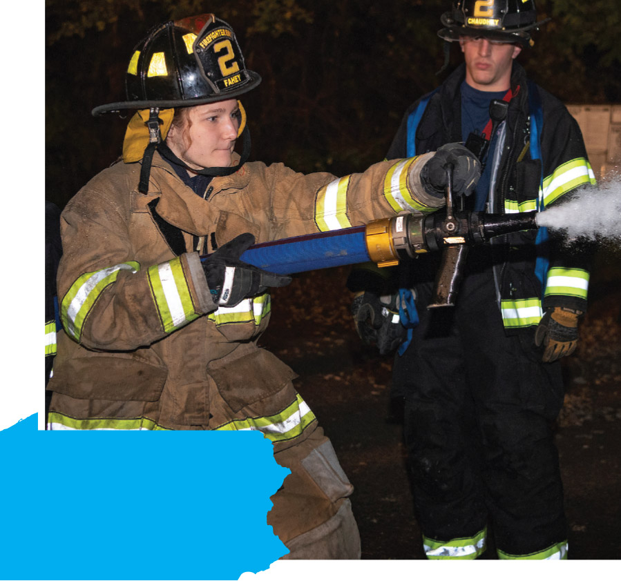 Ava Warfel Ava Warfel ’22 (left) volunteers for the Lewisburg engine company.