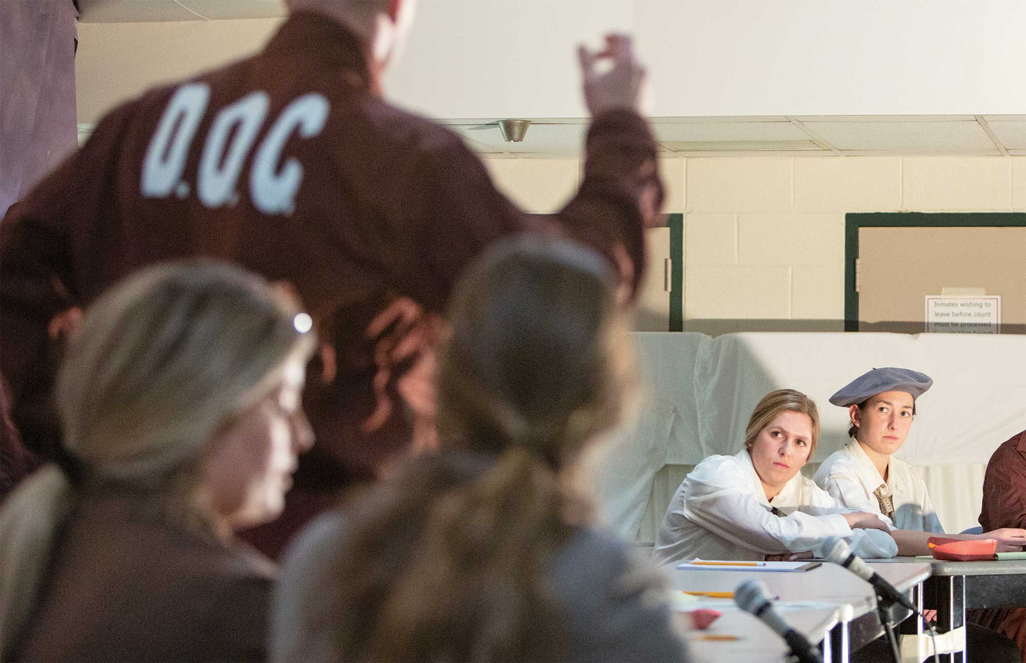 Emma Jaeger ’21, as Juror No. 10, and Natalie Minella ’20, as Juror No. 11 (far right), react to Rob, Juror No. 3.