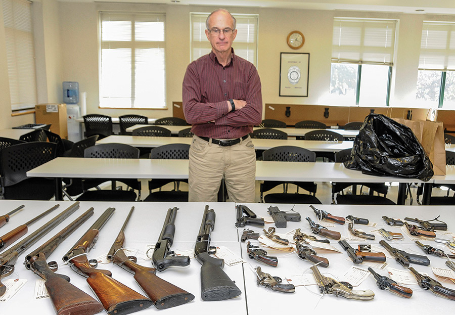 Peter Murchison ’73, P’02 Peter Murchison ’73, P’02 with weapons voluntarily turned in at a gun buyback in Norwalk, Conn., in October 2019