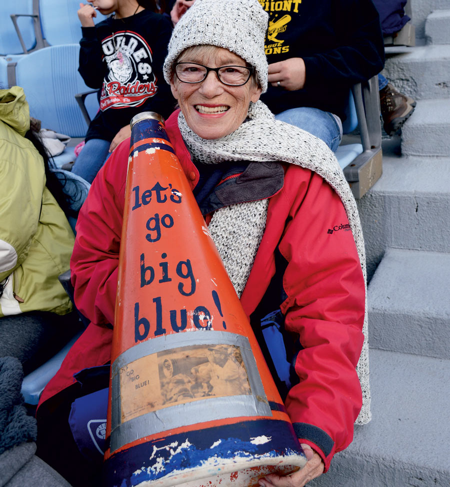 Let's Go Big Blue! fan in the stands at a football game