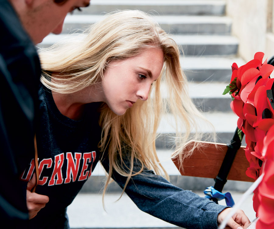 Bucknell students reading memorial Bucknell students reading the memorial
