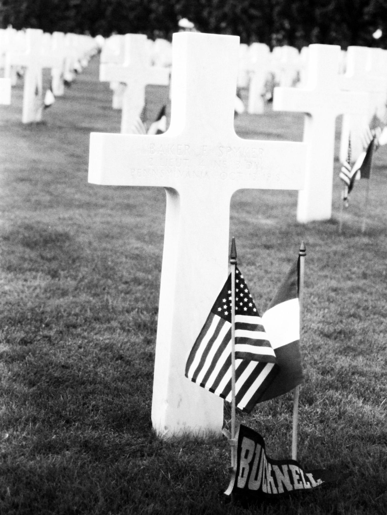 Military Cemetery with Bucknell flag Military Cemetery with Bucknell flag next to headstone