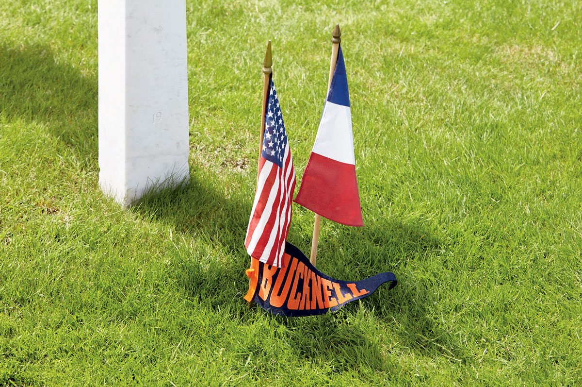 French and American flags French and American flags at the base of a headstone